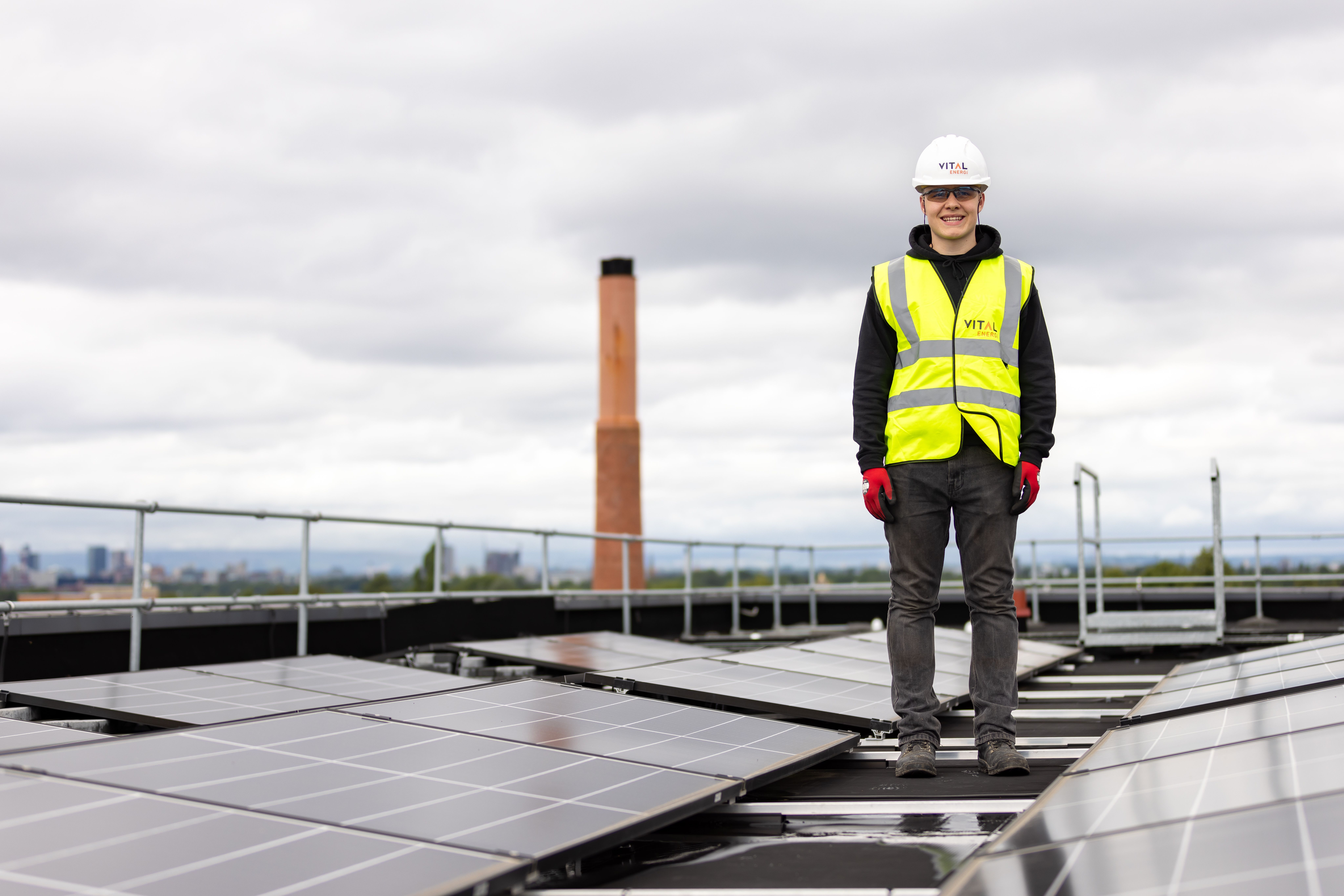 Engineer inspecting solar energy infrastructure